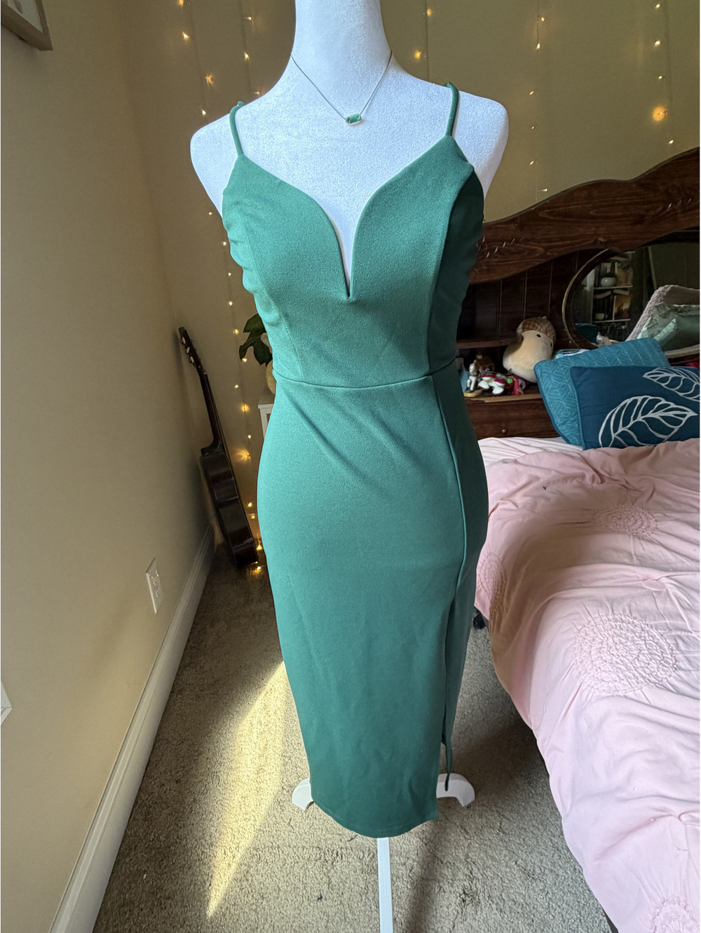 This gorgeous emerald green midi cocktail dress from Windsor